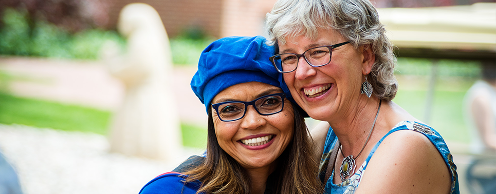 associate professor karen bensen with graduate 