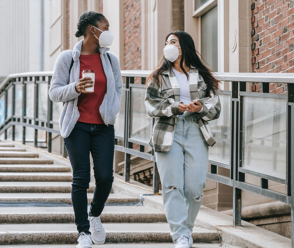 Two girls walking together