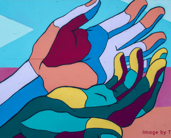 Wall mural featuring multi colored hands