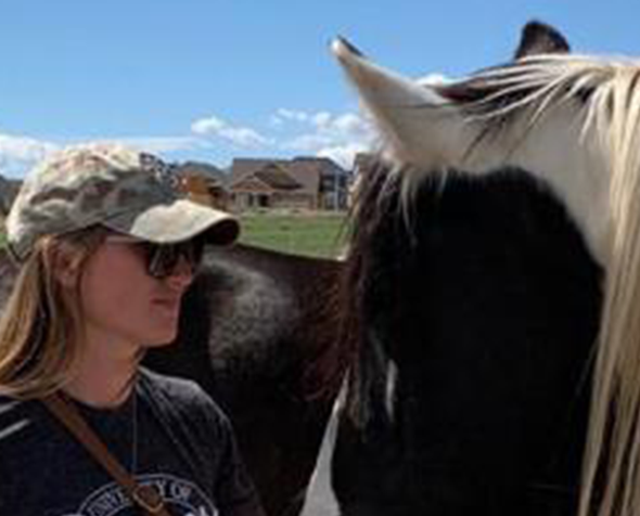 student with horse