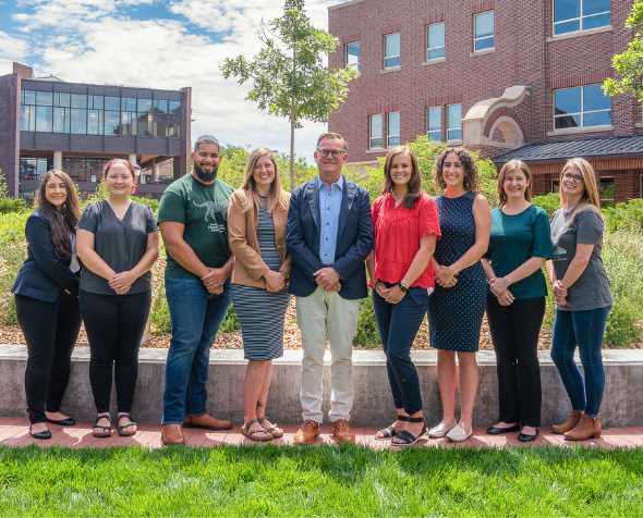 IHAC Research team in a group photo outside on the DU campus