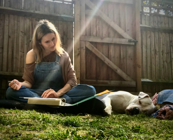 Mara-Daria Cojocaru with her dog outside