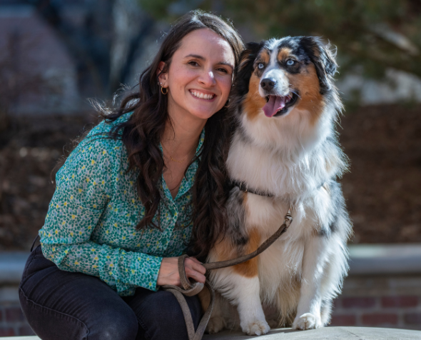 Smiling and happy woman with pet dog