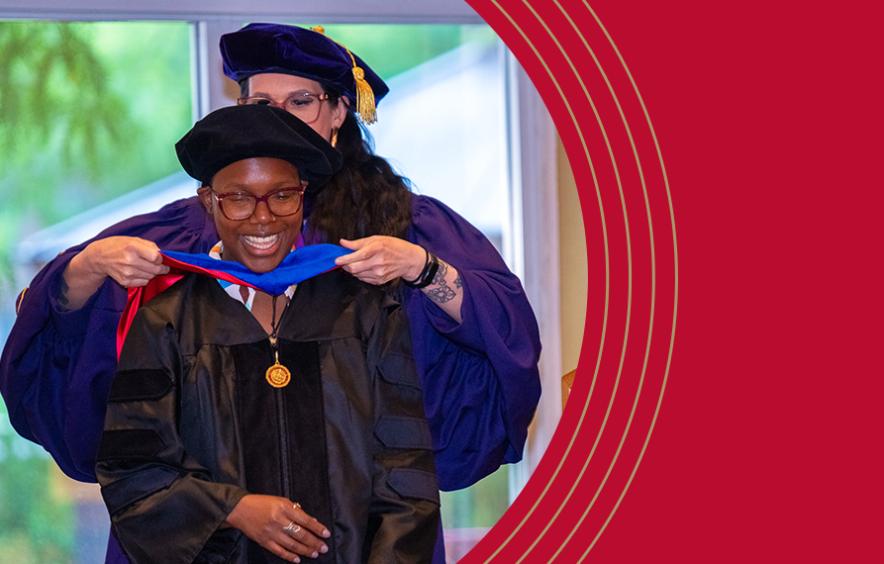 Phd Graduate Annie Zean dunbar during the hooding ceremony