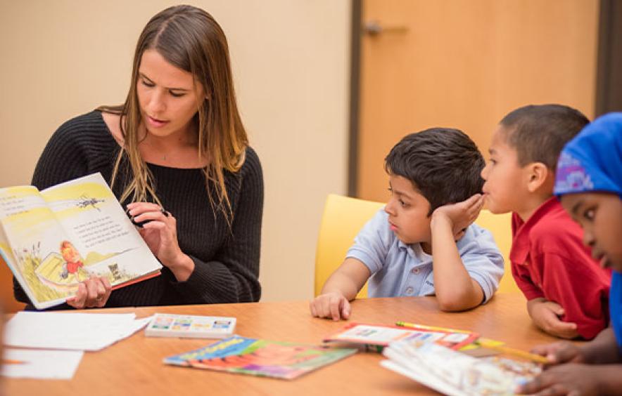 woman working with children