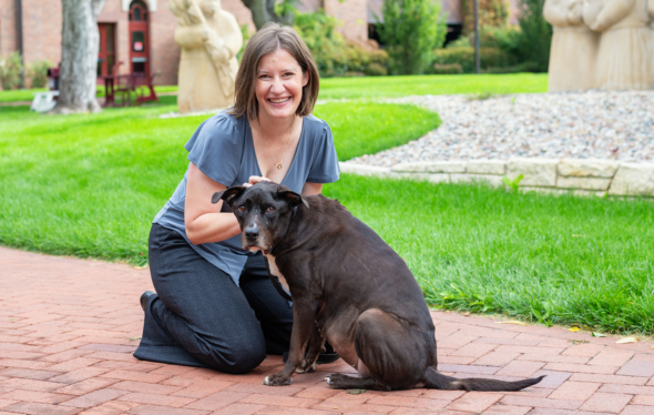 Research Associate Jaci Gandenberger with pet dog Sophie