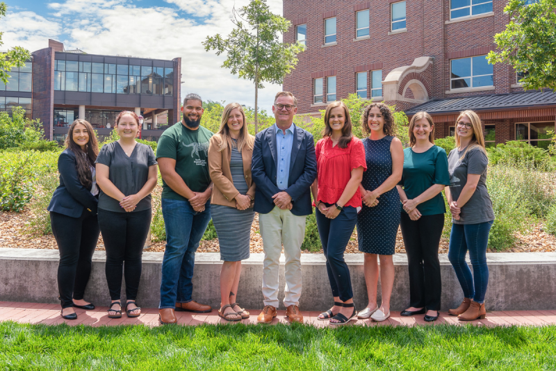 IHAC Research team in a group photo outside on the DU campus