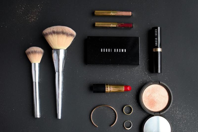 makeup brushes, lipstick, lip liner, mirror 