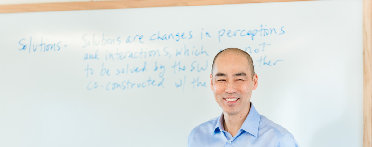 professor Johnny Kim at white board