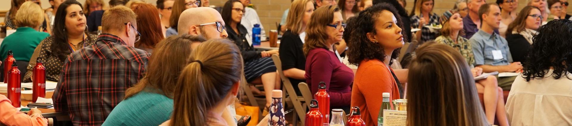 shot of audience watching presentation